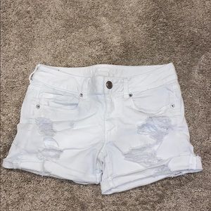 American Eagle white ripped jean shorts